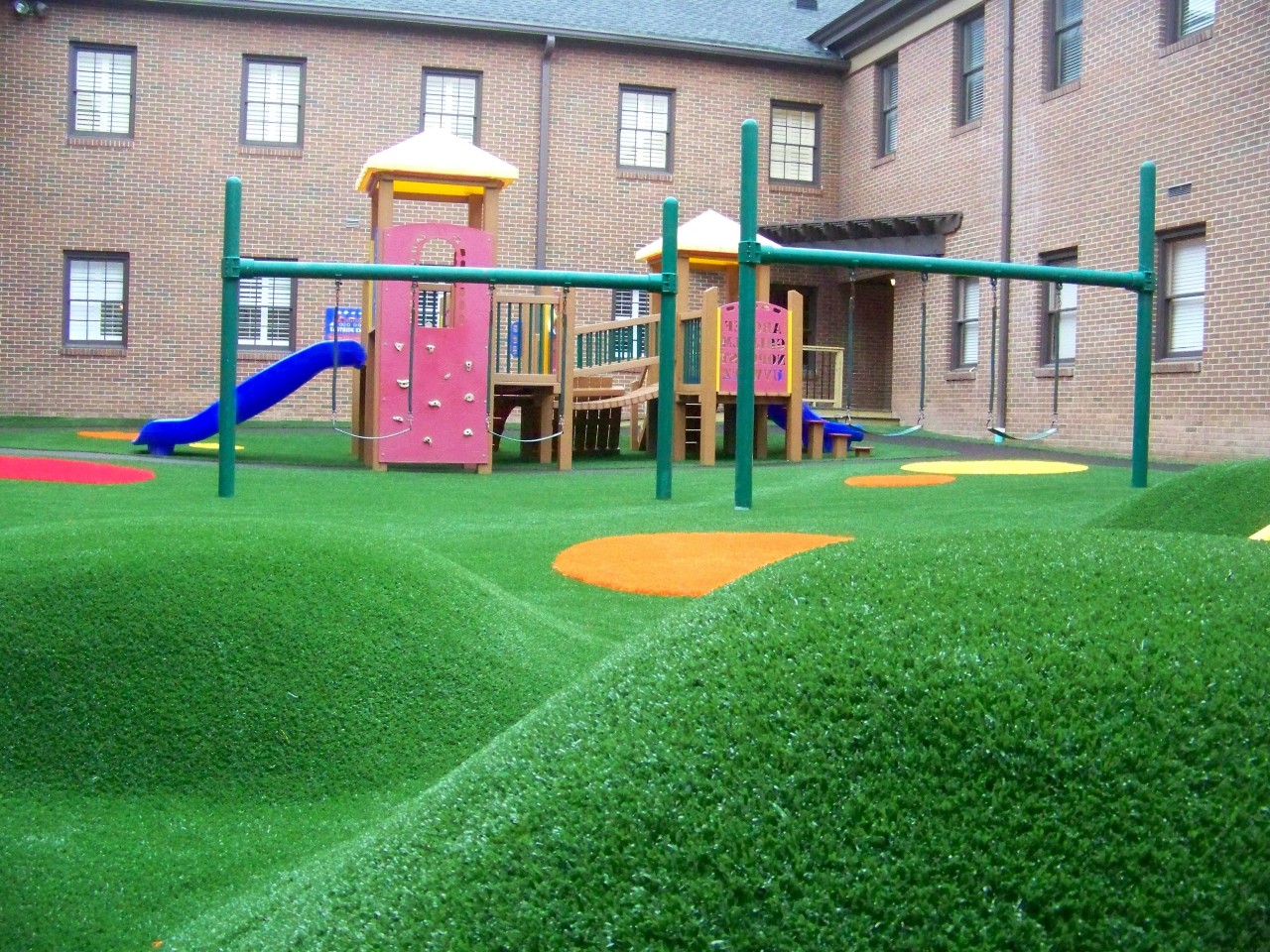 Hilly artificial turf playground by Southwest Greens of Atlanta